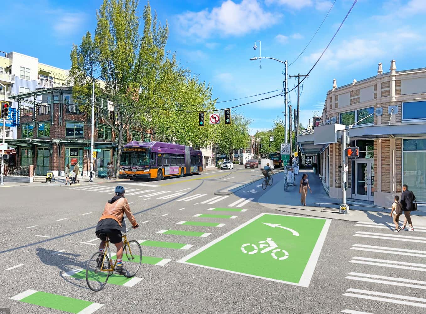 A bicyclist crosses a city intersection.