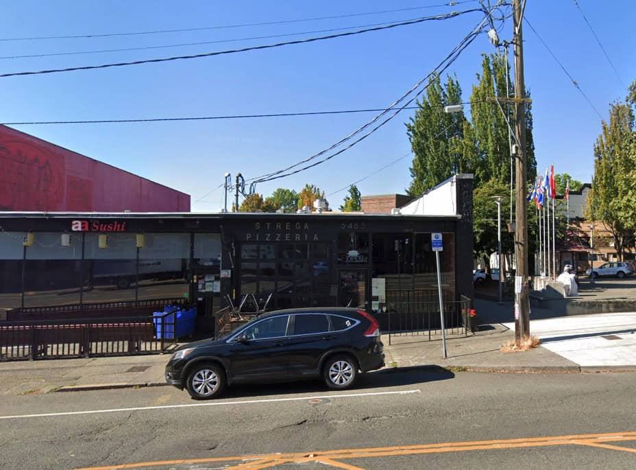 A restaurant building on a quiet street.